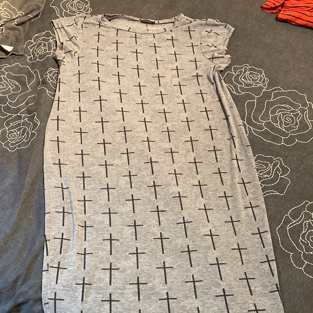 T-shirt dress, slim fitting, grey with black crosses.